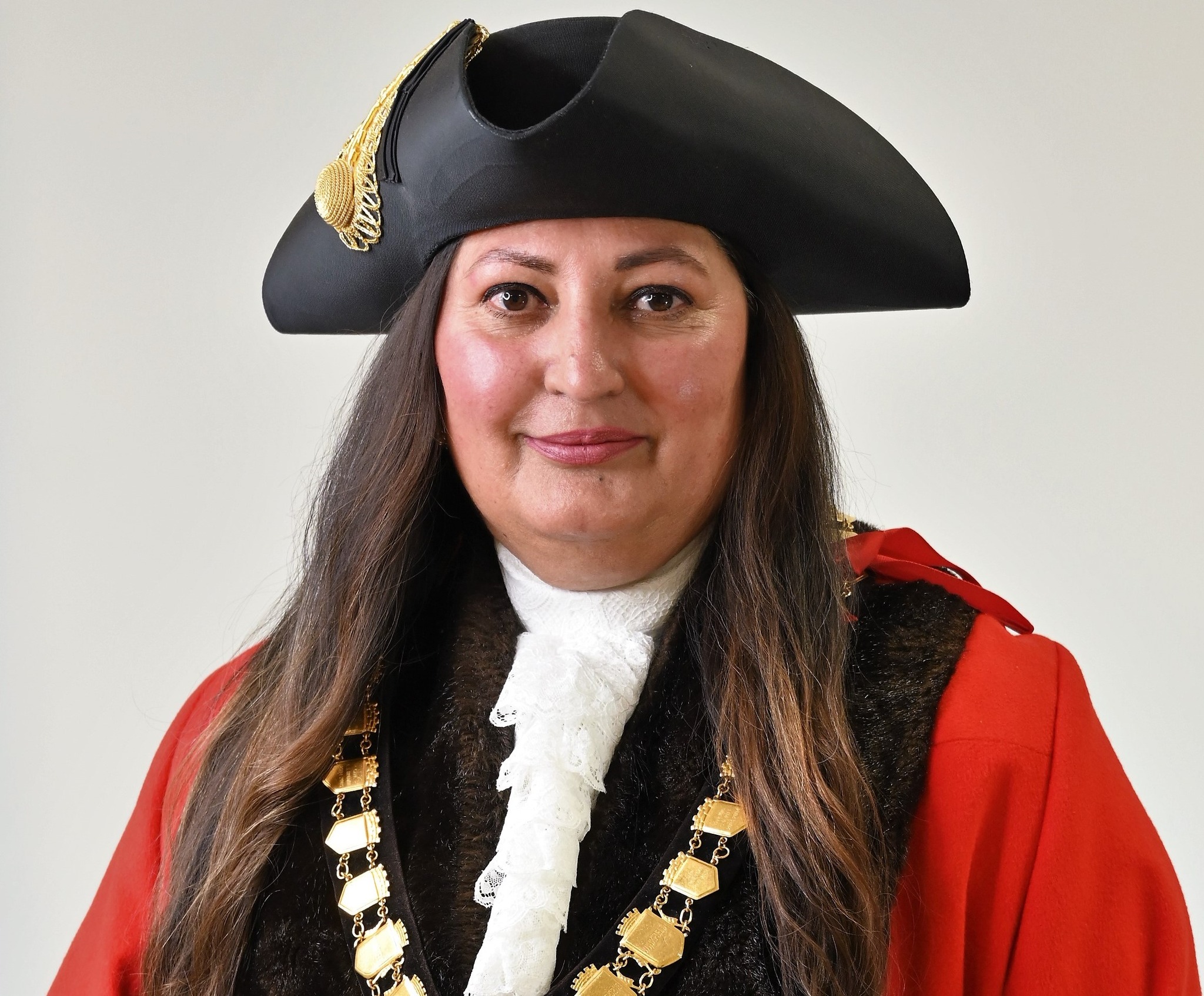 Former Mayor of Bracknell Forest Naheed Ejaz wearing mayoral regalia.