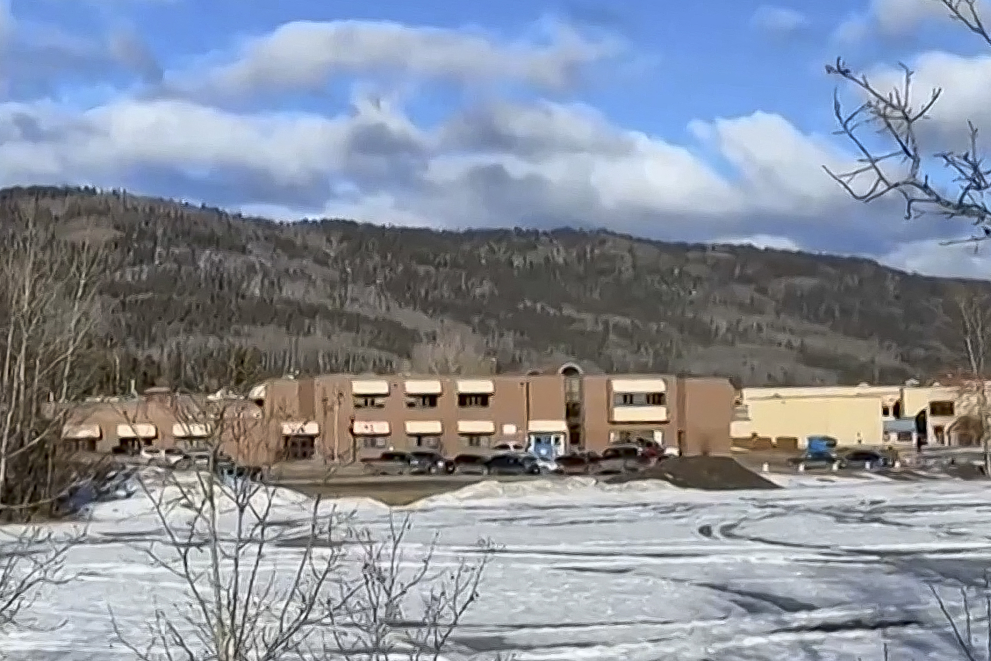 A screengrab shows the middle school and high school building where a shooting took place in Tumbler Ridge, British Columbia.