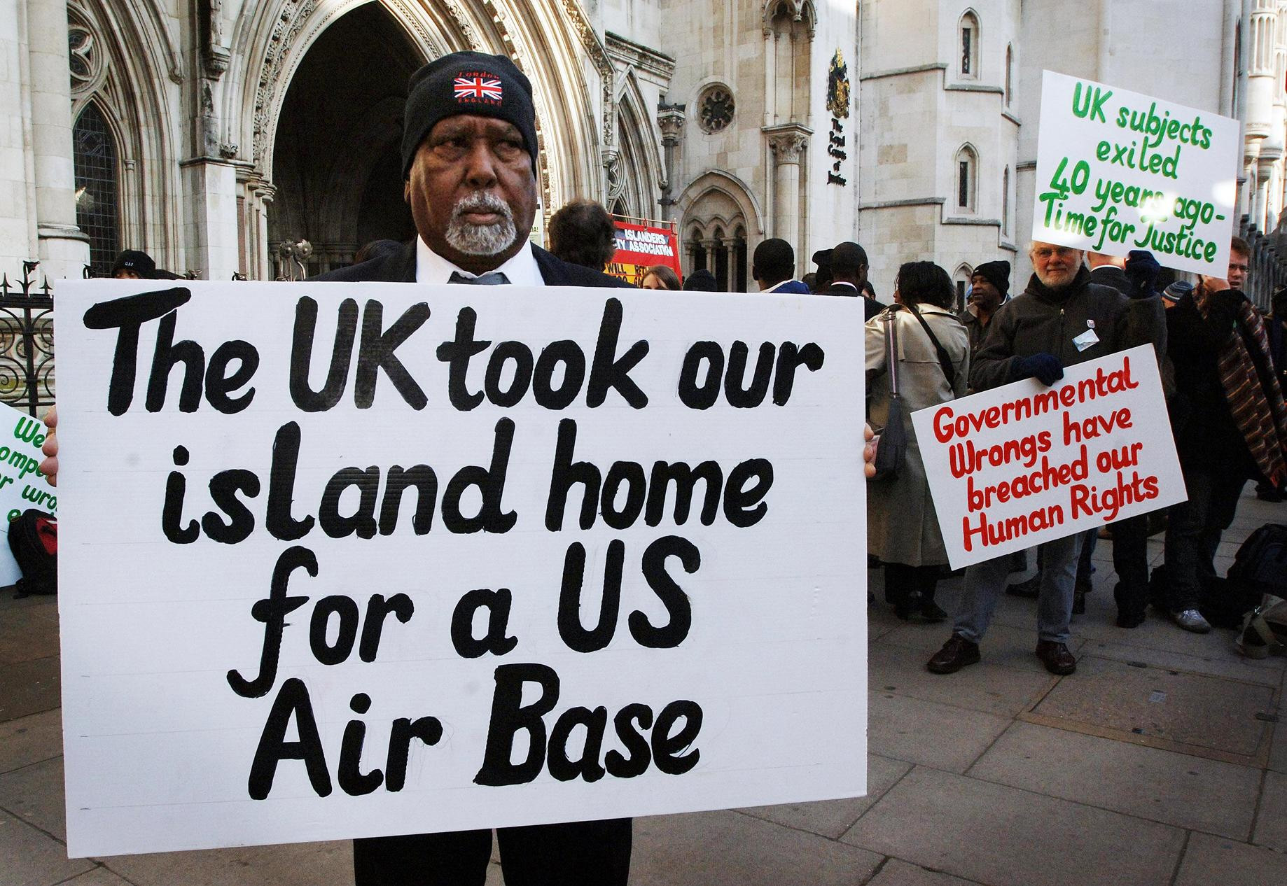Rosemond Sameenaden and other Chagos islanders protest for the reinstatement of their homeland outside the High Court in London.