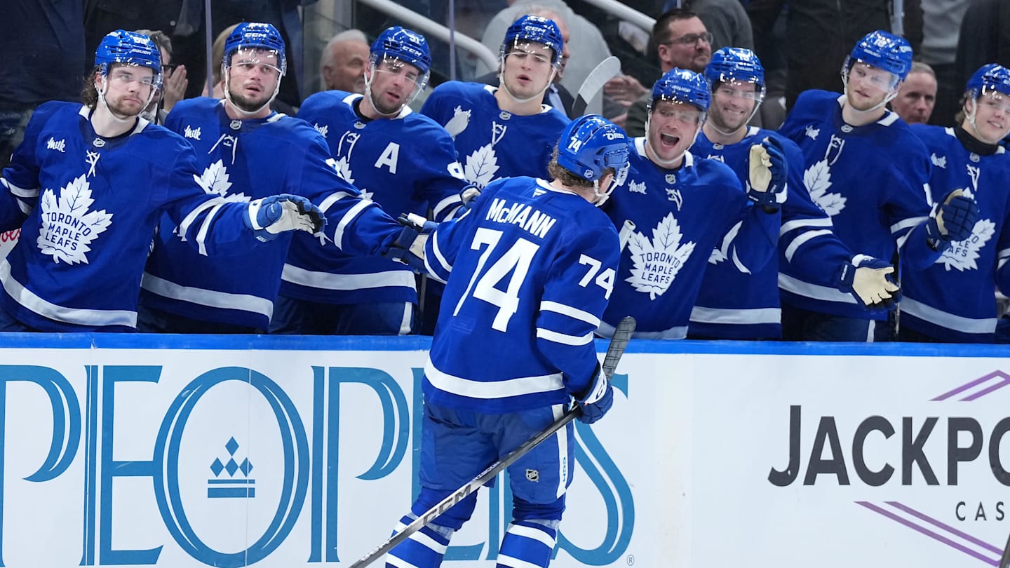 Jan 6, 2026; Toronto, Ontario, CAN; Toronto Maple Leafs center Bobby McMann (74) celebrates at the bench after scoring an empty net goal against the Florida Panthers during the third period at Scotiabank Arena. Mandatory Credit: Nick Turchiaro-Imagn Images