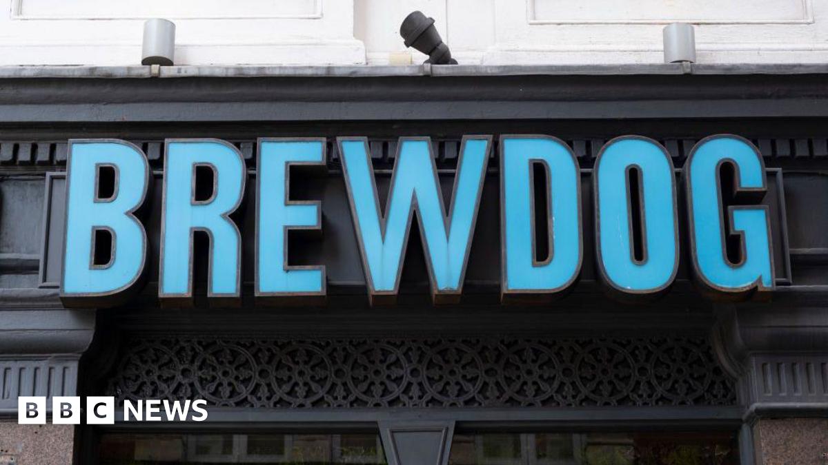 A blue sign which says Brewdog on a building.
