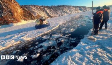 Russian rescuers work at the scene after a tour bus with Chinese tourists plunged under the ice of Lake Baikal. Photo: 20 February 2026