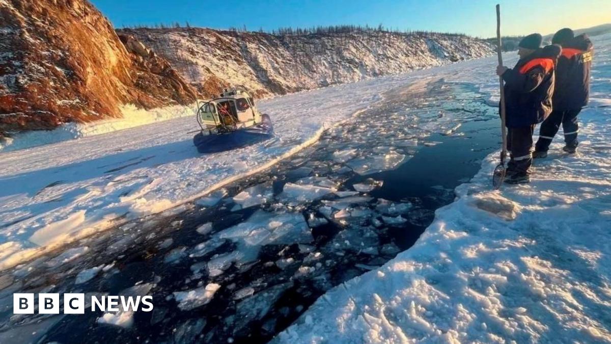 Russian rescuers work at the scene after a tour bus with Chinese tourists plunged under the ice of Lake Baikal. Photo: 20 February 2026