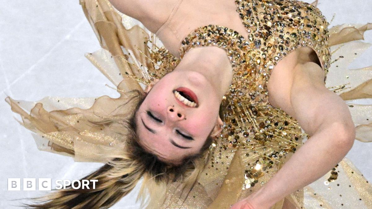 Silver medallist Japan's Kaori Sakamoto, gold medallist USA's Alysa Liu and bronze medallist Japan's Ami Nakai