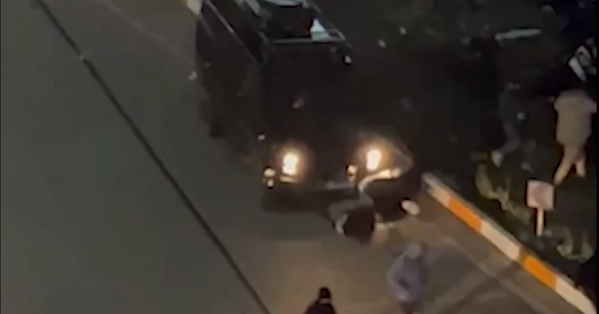 Canada condemns Iran after video shows armored car running over protesters