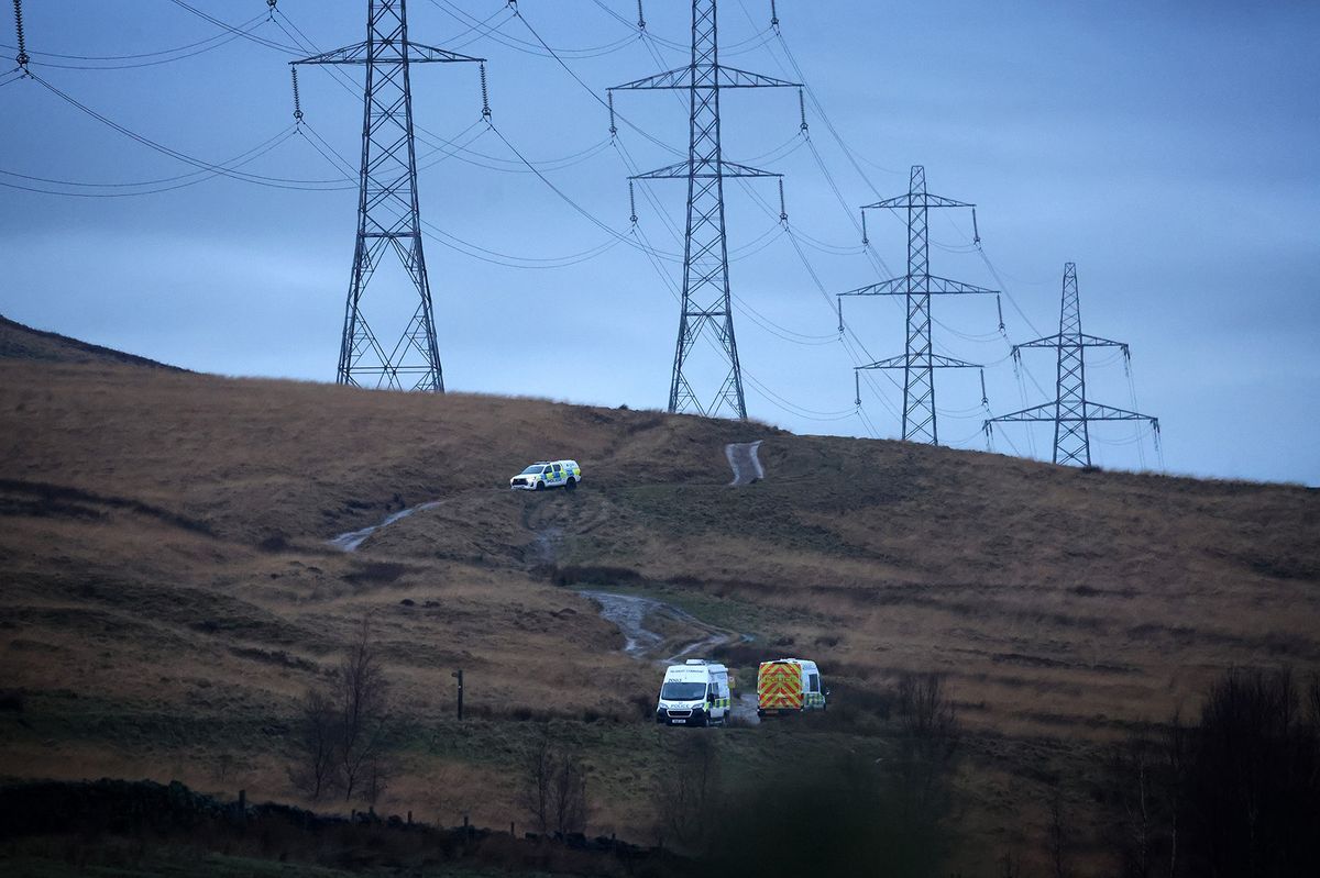 Emergency services at the scene of a light aircraft crash in Littleborough