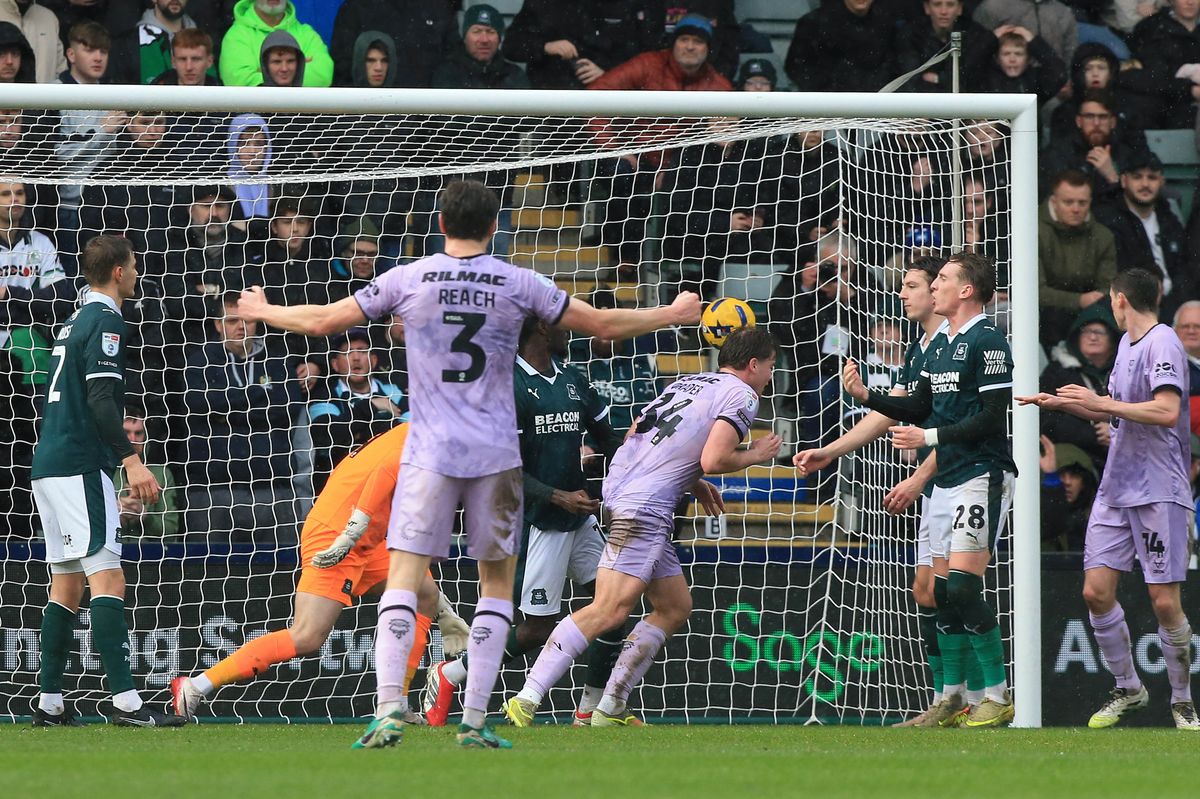 Lincoln striker Freddie Draper scores with a close range header in the League One game against Argyle at Home Park on February 7, 2026 - Photo: Dave Rowntree/PPAUK