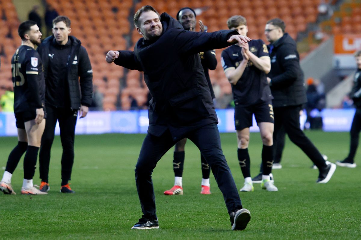 Argyle head coach Tom Cleverley celebrates after the 4-0 League One win against Blackpool at Bloomfield Road on 14 February, 2026 (Photo by Steve Taylor/PPAUK)