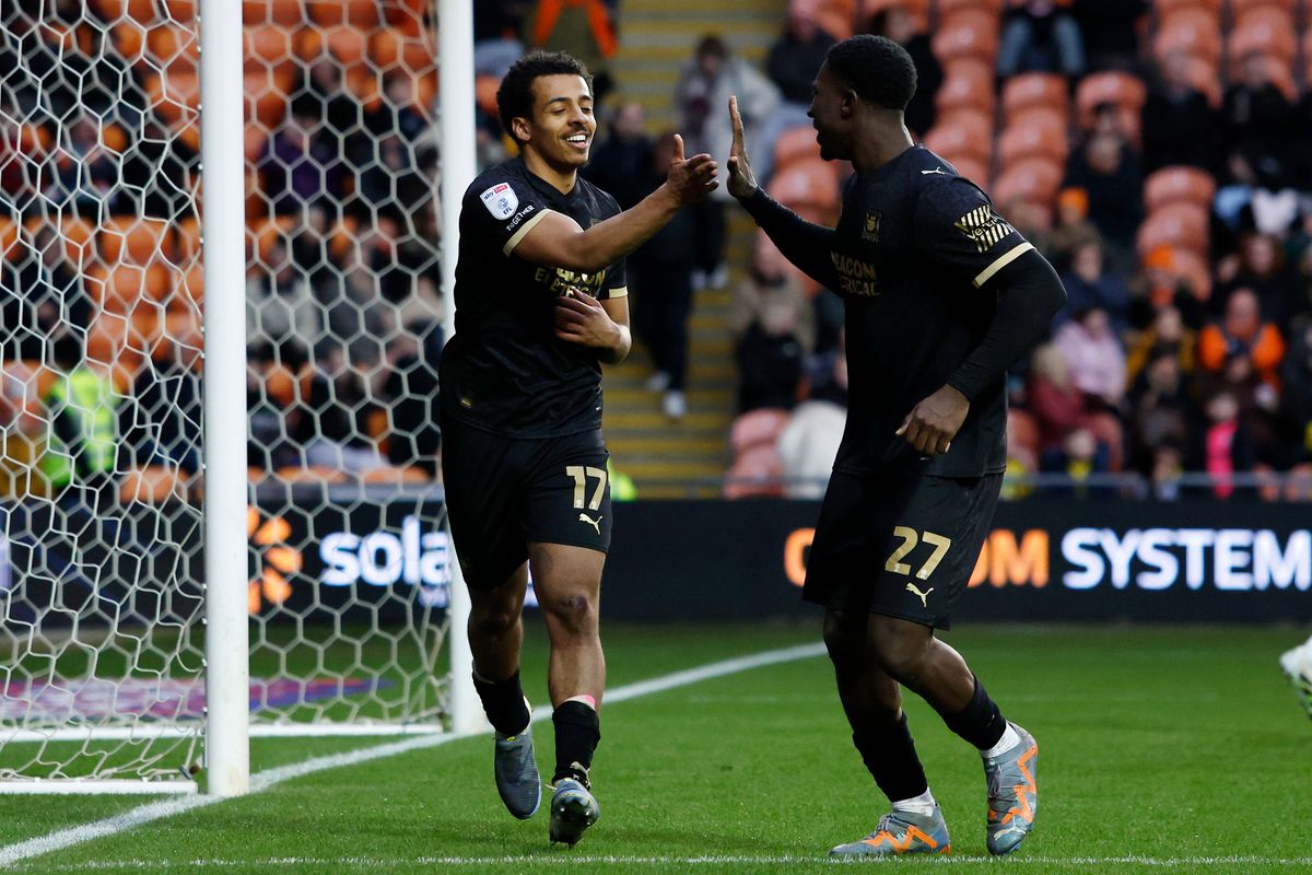 Goal celebrations for Caleb Watts of Plymouth Argyle who celebrates with Bim Pepple during the EFL League One match between Blackpool and Plymouth Argyle at Bloomfield Road on 14 February 2026 in Blackpool, England (Photo by Steve Taylor/PPAUK)