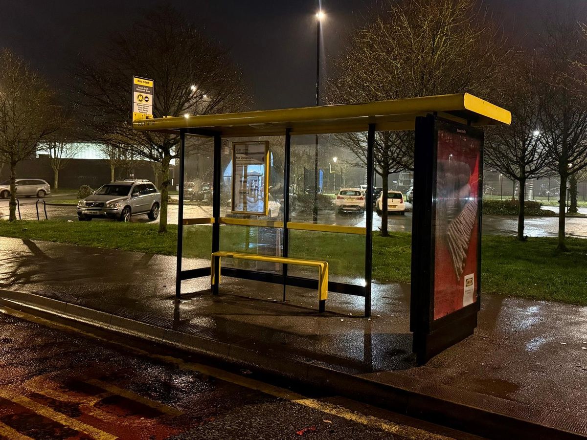 Bus stop in Stockbridge Village shopping parade which services the 12 and 13 routes