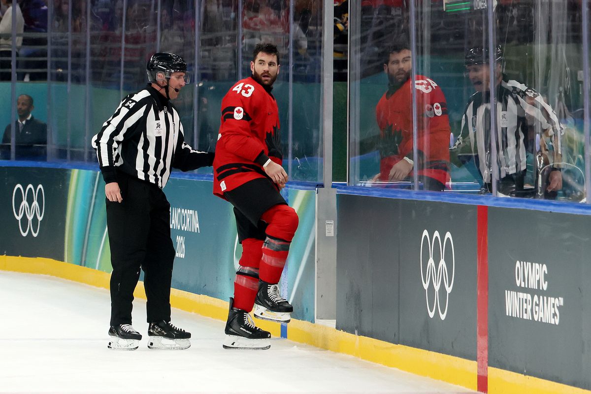 Wilson leaves the ice rink after being ordered to the locker rooms by officials