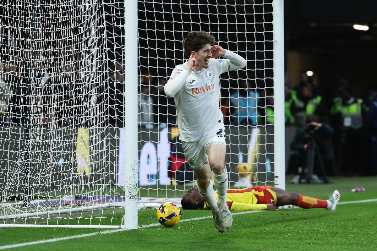 Josh Key of Swansea City celebrates after scoring the second goal