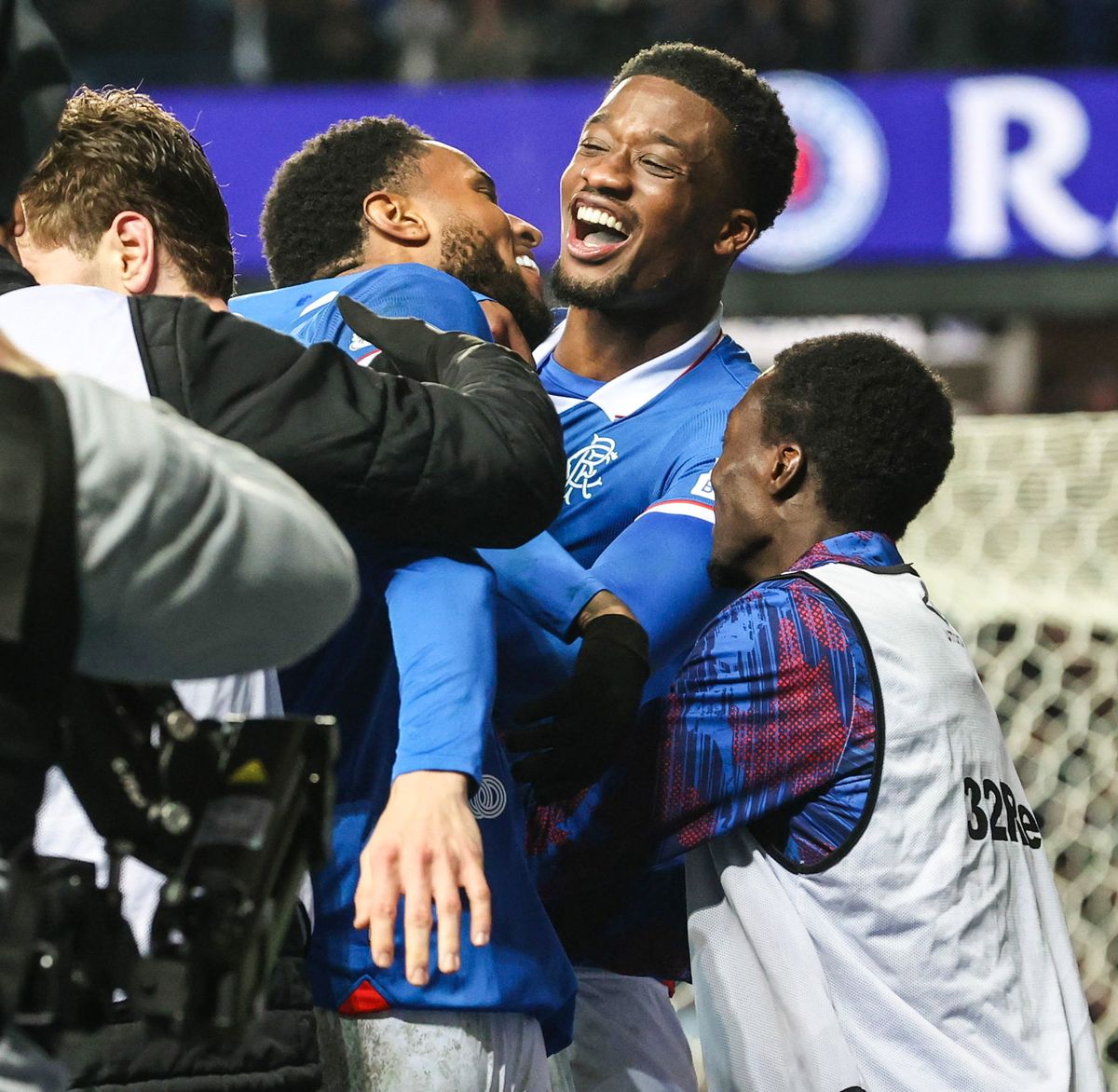 Rangers' Youssef Chermiti (L) celebrates scoring to make it 3-2 with Emmanuel Fernandez