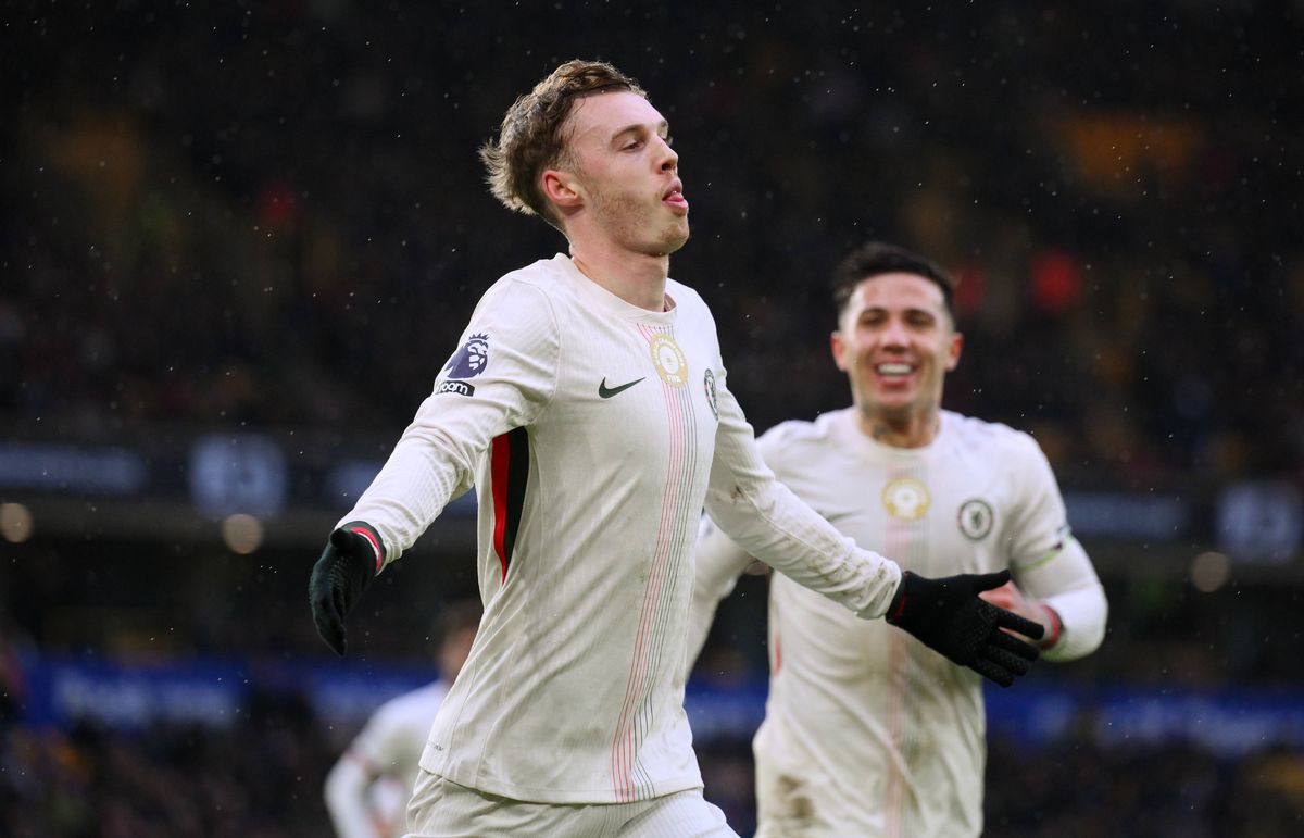 Cole Palmer celebrates scoring his team's third goal during the Premier League match between Wolverhampton Wanderers and Chelsea at Molineux. 