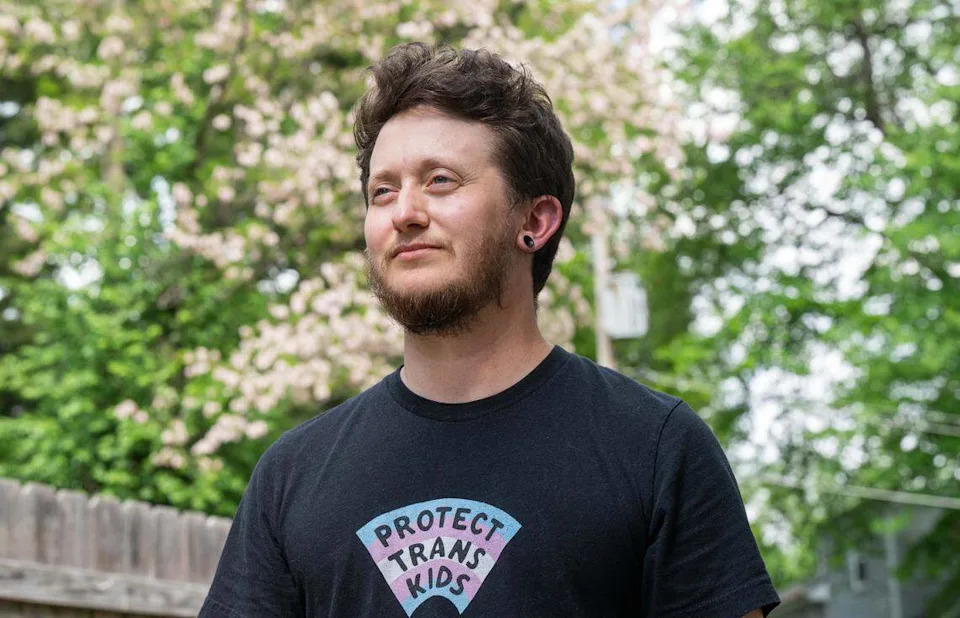 Riley Long of Shawnee is one of the 1,800 trans Kansans whose driver’s license was made invalid Thursday because of a new Kansas law. He posed for a portrait in May.