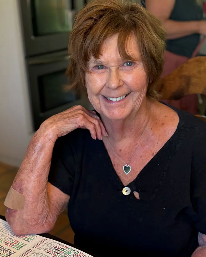 Smiling older woman with short hair sitting at a table, related to Nancy Guthrie disappearance and FBI investigation updates. Smiling older woman with short hair sitting at a table, related to Nancy Guthrie disappearance and FBI investigation updates.