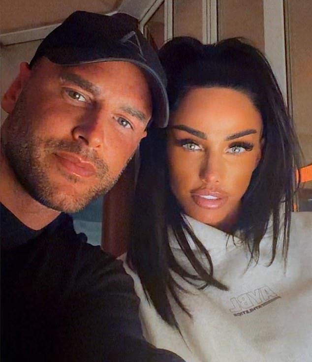 Katie Price's new husband Lee Andrews (pictured together) spent three weeks locked up in a Dubaijail for allegedly forging his ex-girlfriend's signature to take out a £200,000 loan in her name and has been banned from leaving the country, it has been claimed