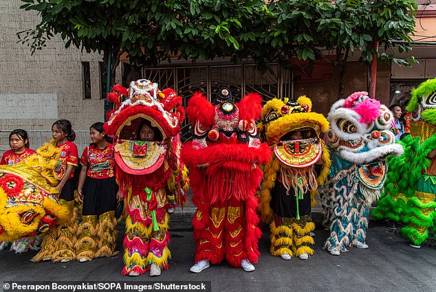 Dancers performing a lion dance during the Chinese Lunar New Year celebration at Chinatown in Bangkok