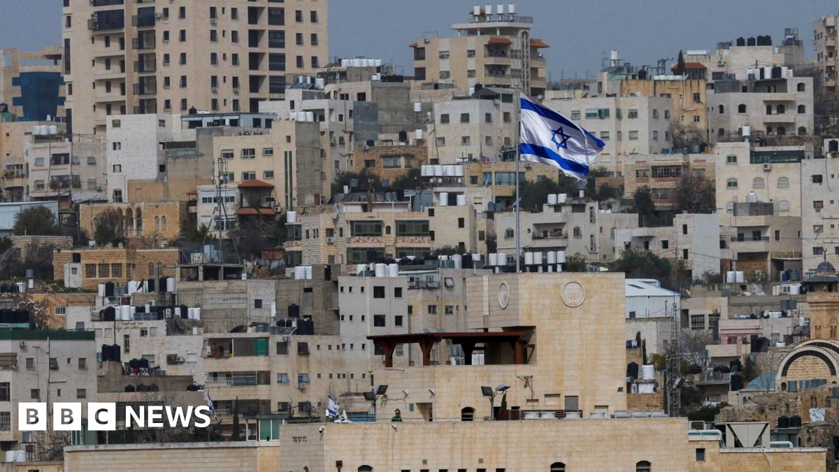 An Israeli flag flies over an Israeli settlement in the old city of Hebron, in the occupied West Bank (9 February 2026)