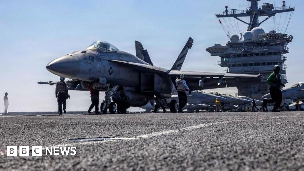 A multirole fighter aircraft prepares to launch from the flight deck of the US Navy's Nimitz-class aircraft carrier USS Abraham Lincoln in the Arabian Sea. Photo: 15 February 2026