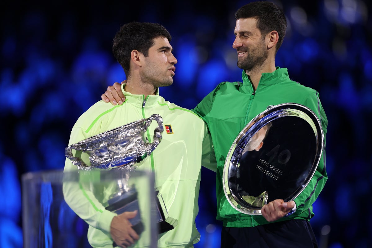 Australian Open live: ‘Legendary’ Carlos Alcaraz completes career grand slam as Novak Djokovic responds to bitter’ defeat