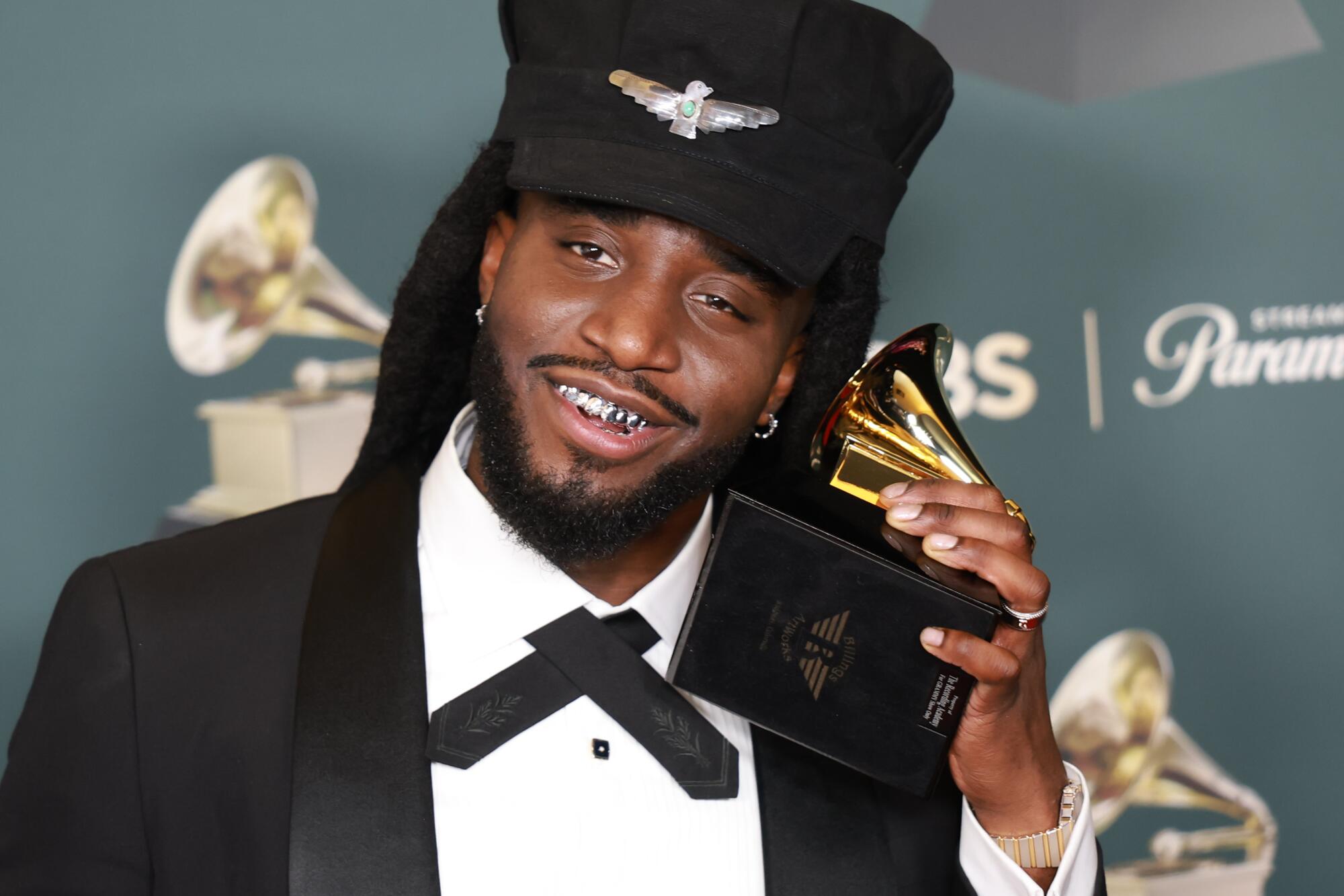Shaboozey holds the Grammy for Best Country Duo/Group Performance