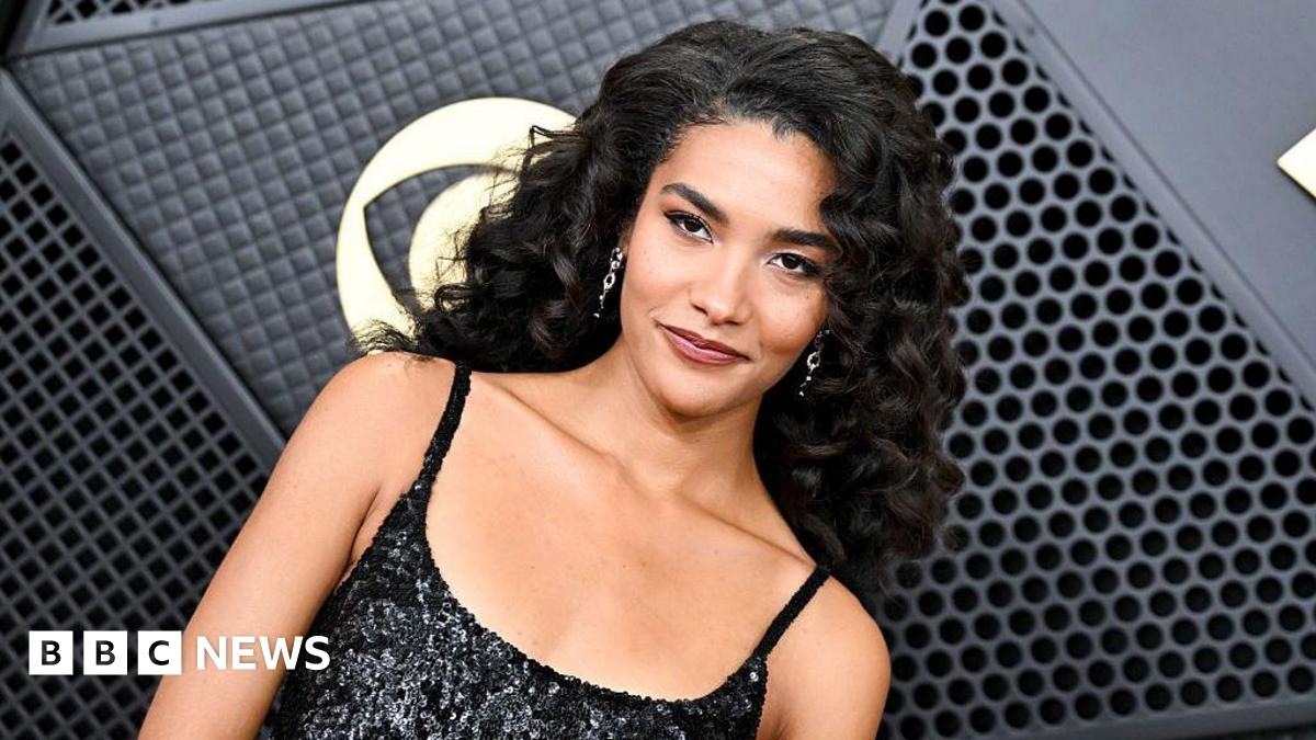 Olivia Dean on the red carpet at the Grammy Awards