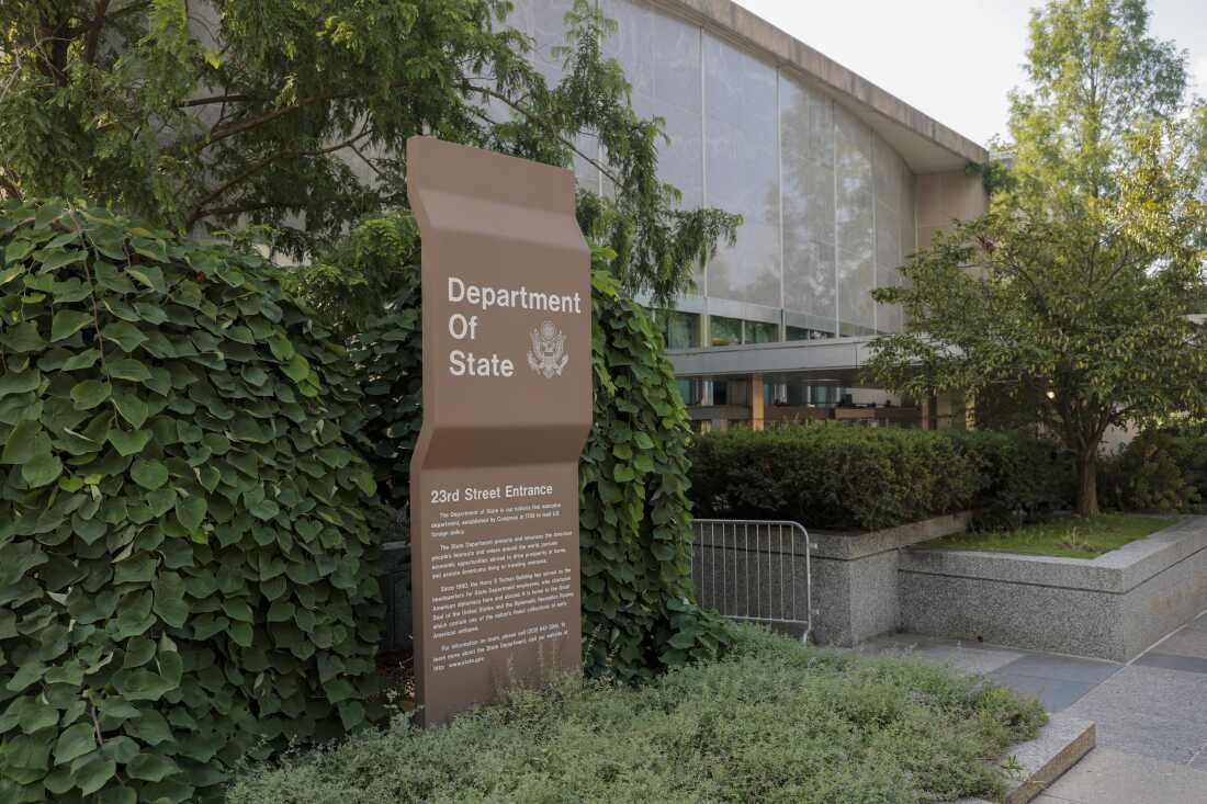 A sign for the U.S. Department of State is seen on the outside of the Harry S. Truman Federal Building on on July 11, 2025 in Washington, DC.