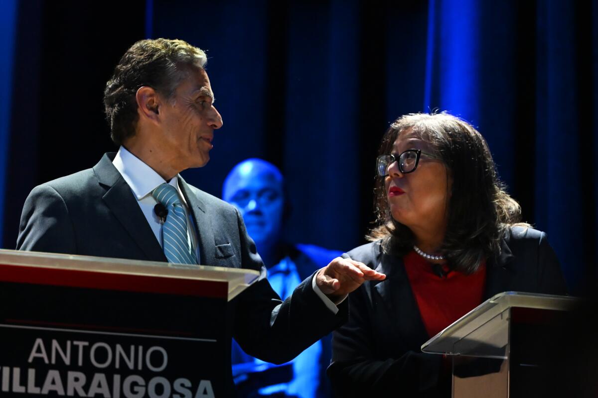 Antonio Villaraigosa  talks to Betty Yee 