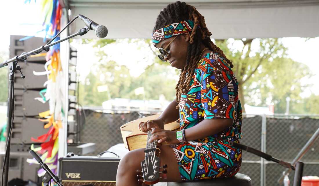 Yasmin Williams, seen here performing during the 2022 Pilgrimage Music & Cultural Festival in Franklin, Tenn., had a confrontation last year with the interim president of the Kennedy Center, where she had been scheduled to perform, over the institution's rollback of DEI initiatives. Williams did not cancel her performance.