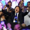 Argentina's President Javier Milei celebrates after winning in legislative midterm elections in Buenos Aires, Argentina, Sunday, Oct. 26, 2025.