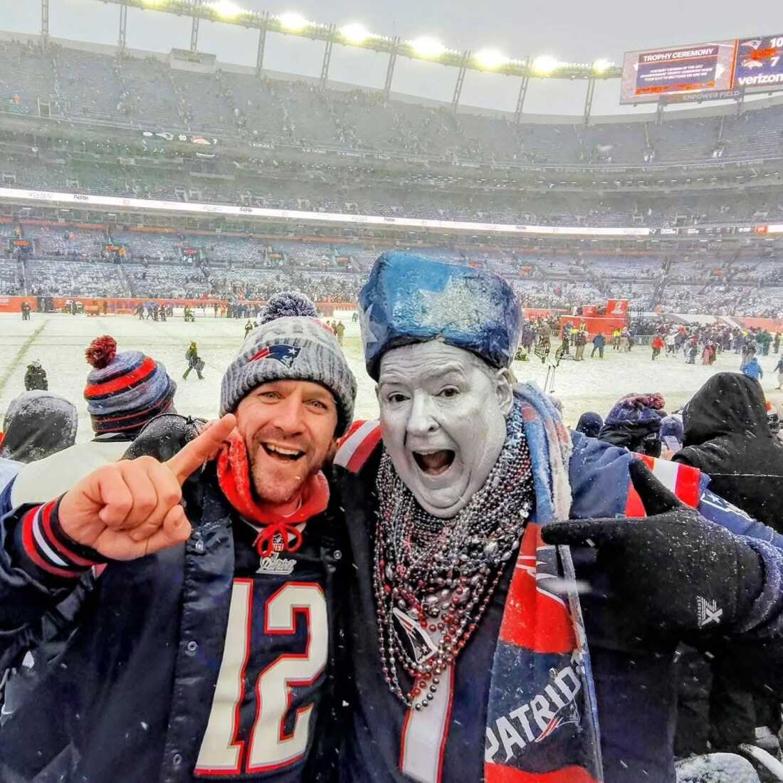 Patriots superfan Keith Birchall (R) celebrated with a friend in Denver for the AFC Championship game and was thrilled to see the Pats punch their ticket to this year’s Super Bowl. He’s old enough to remember the Pats’ losing years, and is appalled by the “cockiness and entitlement” in many spoiled young Pats fans today.