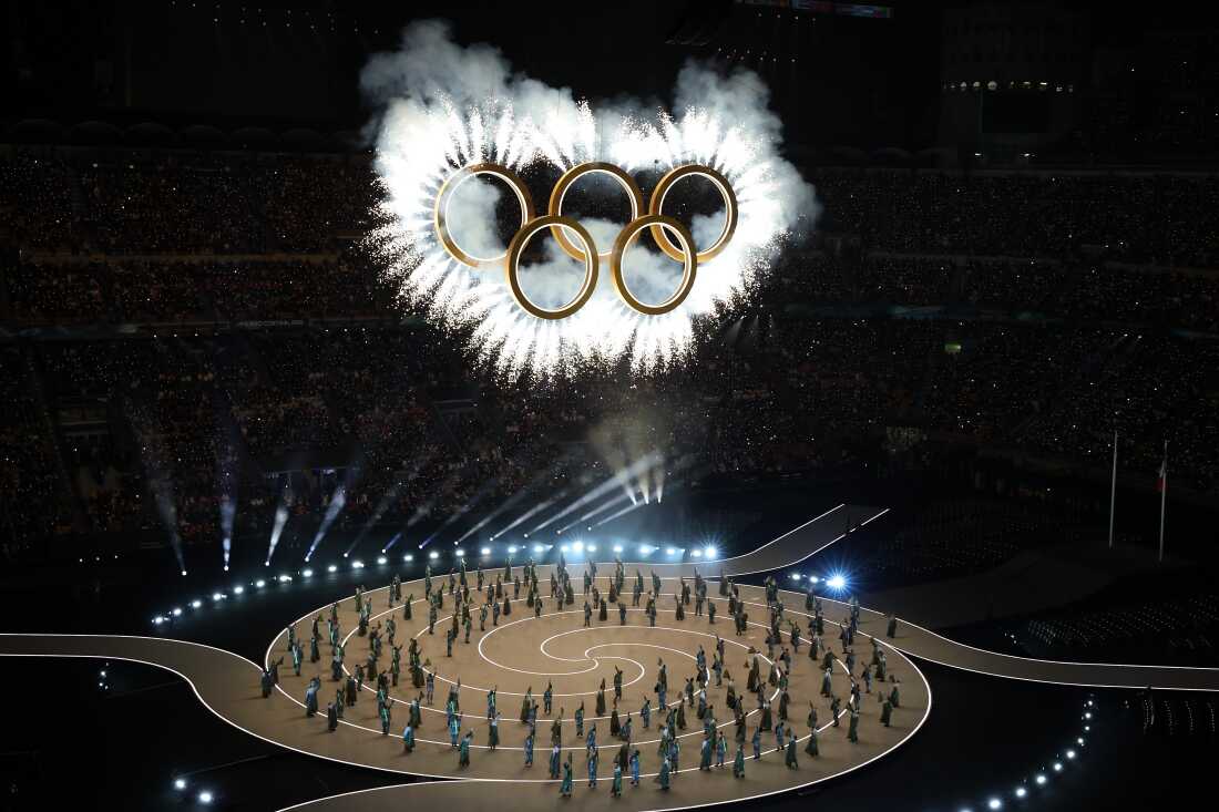 The formulation of the Olympic rings — and fireworks bursting out of them — drew large cheers from the crowd.