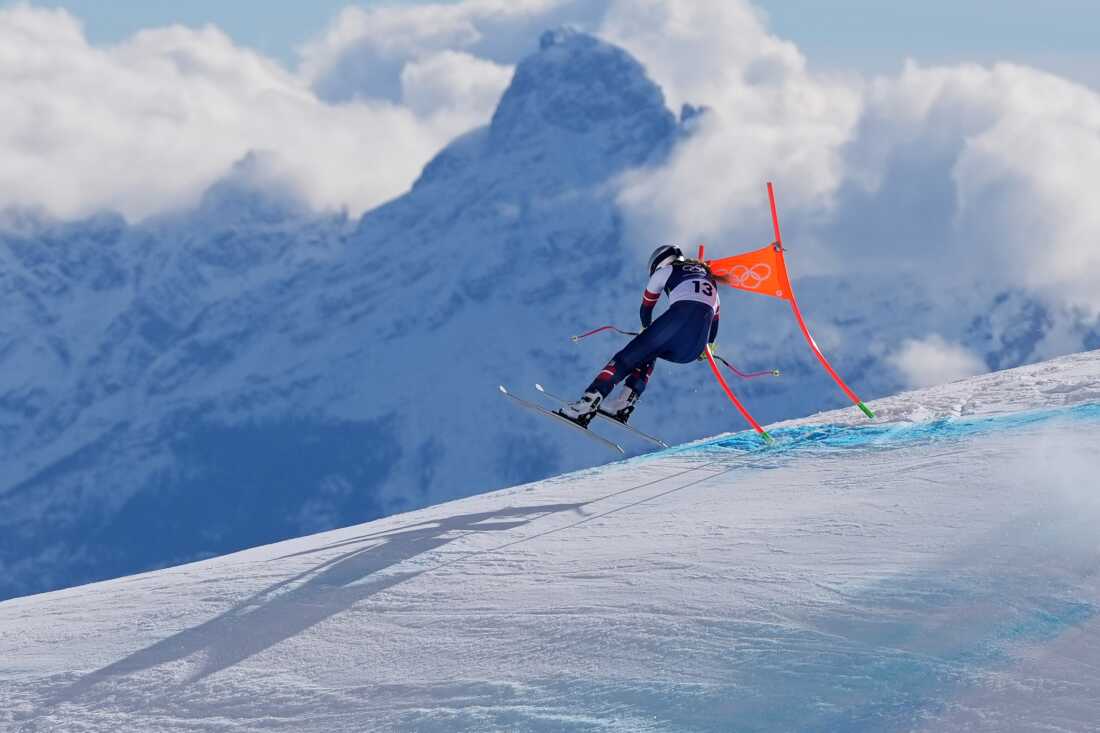 United States' Lindsey Vonn crashes into a gate during an alpine ski women's downhill race, at the 2026 Winter Olympics, in Cortina d'Ampezzo, Italy, Sunday, Feb. 8, 2026.