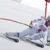 Lindsey Vonn speeds down a snow-covered course in Italy. 