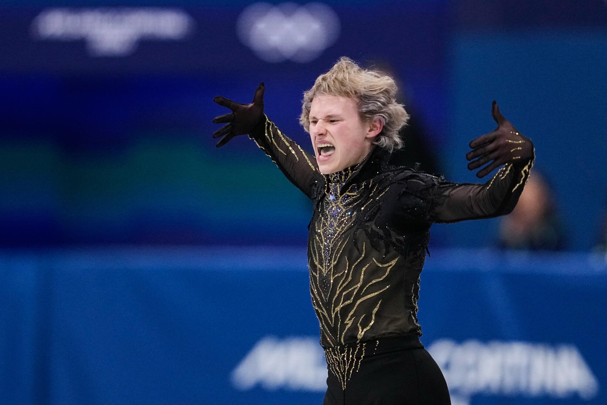 Ilia Malinin of the United States competes during the figure skating men's team.