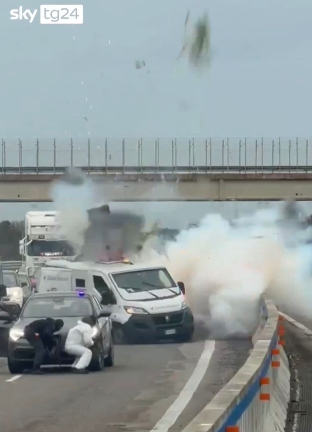 The van explodes in the clip as the crooks attempt to rob it