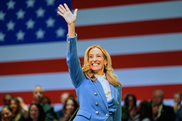 New Jersey Gov. Mikie Sherrill waves during her inauguration ceremony in Newark, N.J., Tuesday, Jan. 20, 2026. (AP Photo/Seth Wenig, File)