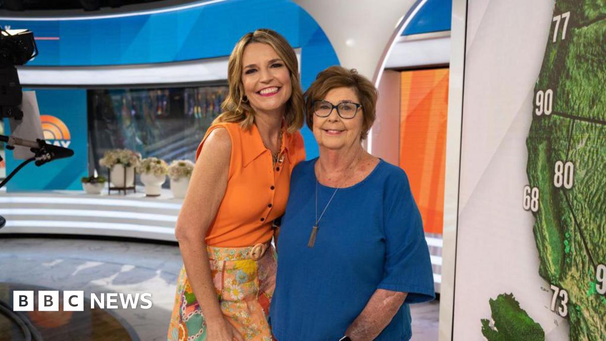 Savannah Guthrie posing for a photo with her mother Nancy in a television studio