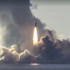 In this photo made from the footage taken from Russian Defense Ministry official web site on Thursday, May 24, 2018, the Russian nuclear submarine Yuri Dolgoruky test-fires the Bulava missiles from the White Sea on Tuesday, May 22, 2018.