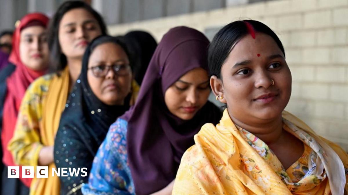 Women stand in a queue to vote outside a polling station during the national election in Dhaka, Bangladesh, February 12, 2026. REUTERS/Fatima Tuj Johora