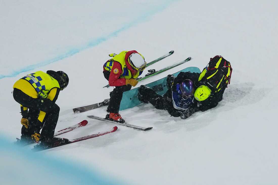 A big crash nearly ended Choi's night early, but after a medical exam she returned to the halfpipe slope for two more runs.