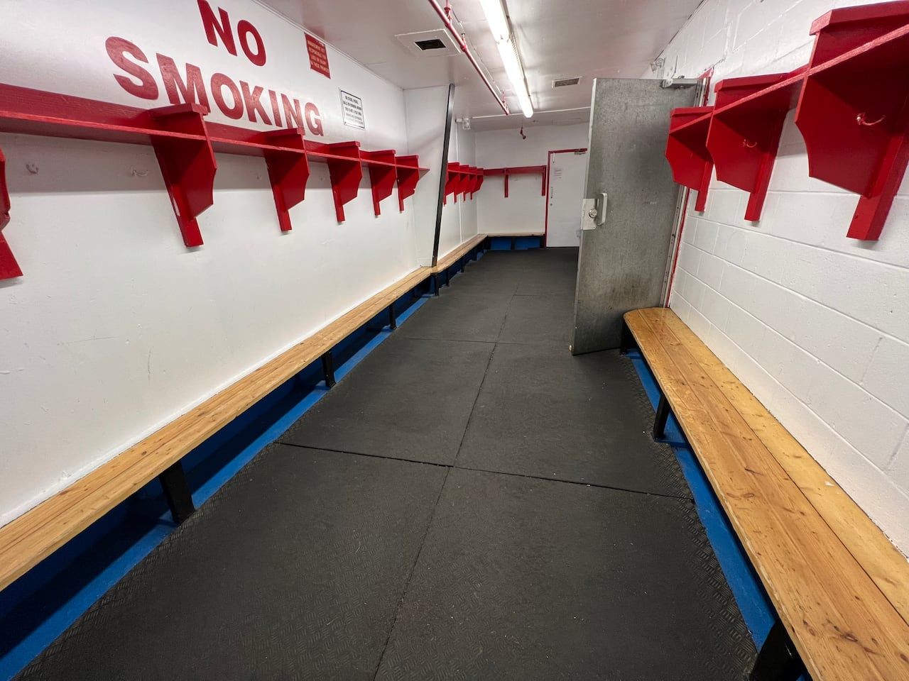 An empty changing room at an arena