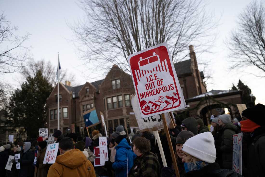 People demonstrate against federal immigration enforcement outside the Minnesota governor's residence in St. Paul on Feb. 6.
