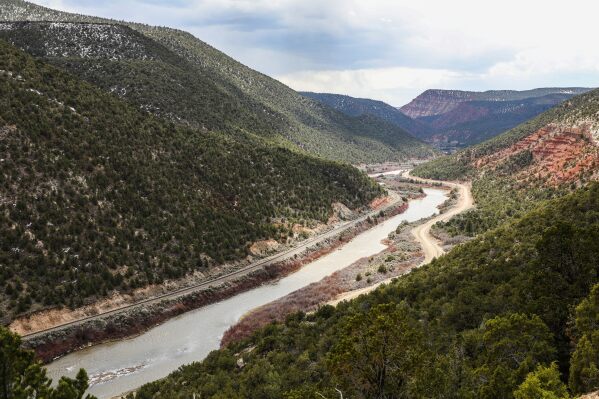 The Colorado River runs through mountains near Burns, Colo., on April 12, 2023. (Chris Dillmann/Vail Daily via AP, File)