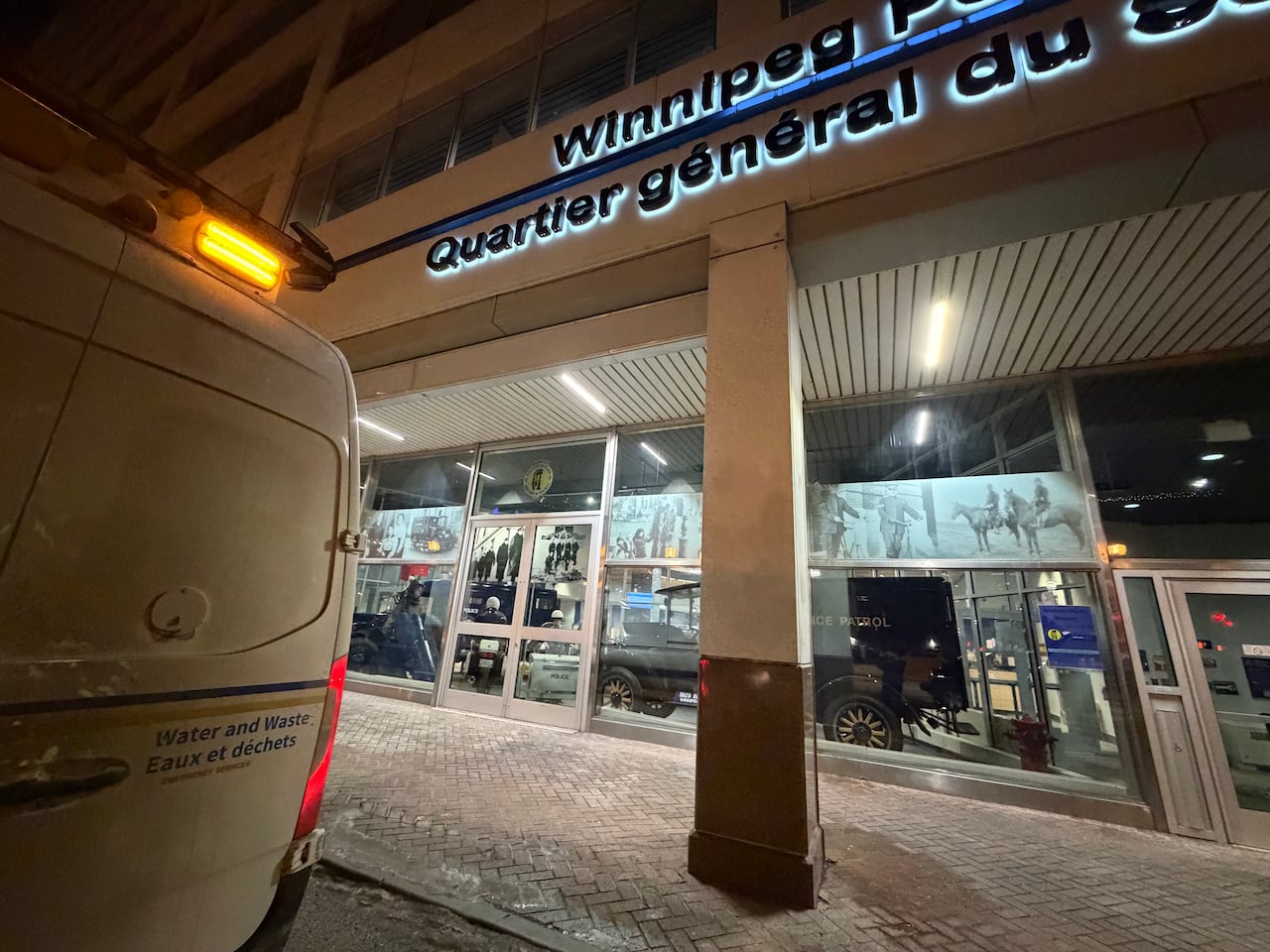 A vehicle is seen outside a building.