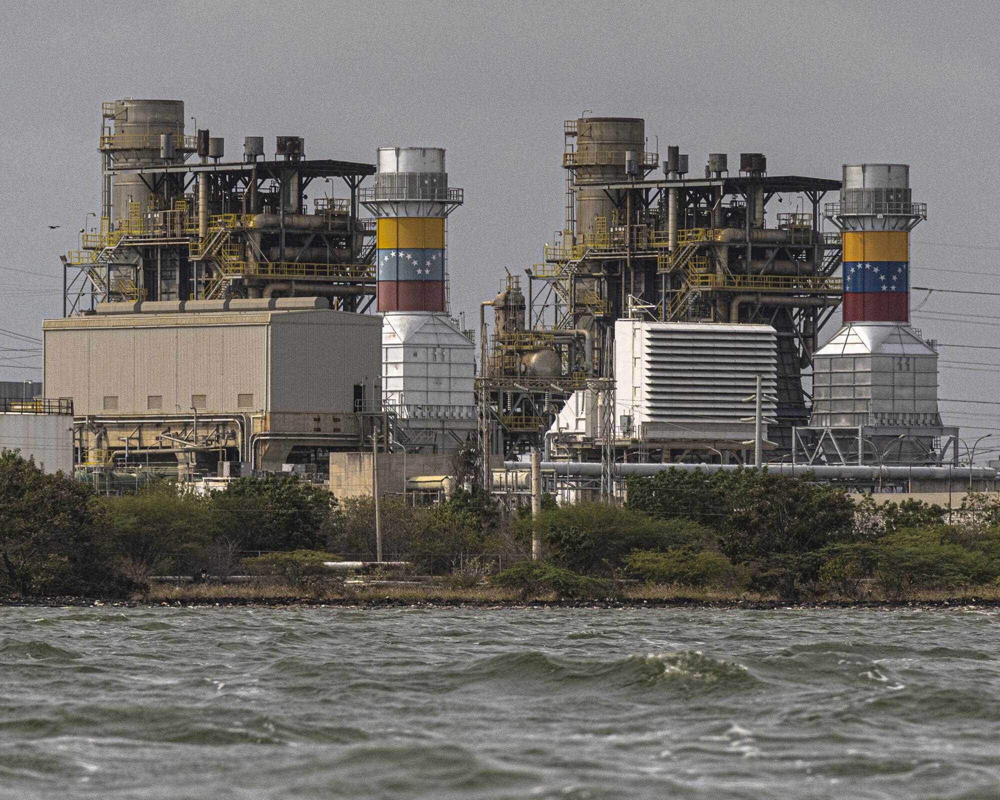 a refinery on the shore of a lake