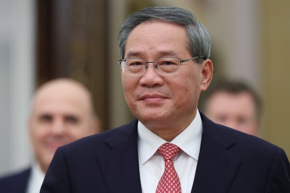 Chinese Premier Li Qiang enters a hall for his meeting with Russian President Vladimir Putin at the Senate Palace of the Kremlin in Moscow, Russia, on Nov. 18, 2025. (Ramil Sitdikov/Pool Photo via AP, File)