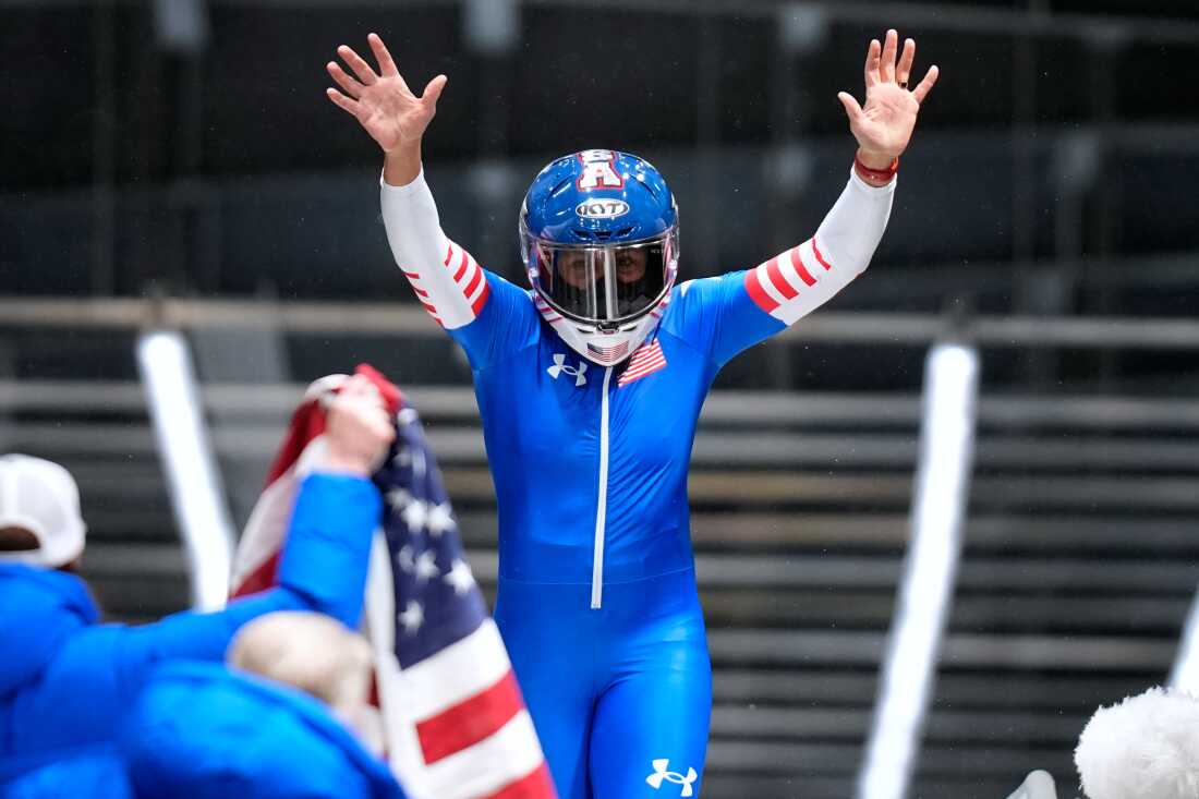 United States' gold medalist Elana Meyers Taylor celebrates at the finish after the women's monobob competition at the 2026 Winter Olympics, in Cortina d'Ampezzo, Italy, Monday, Feb. 16, 2026.