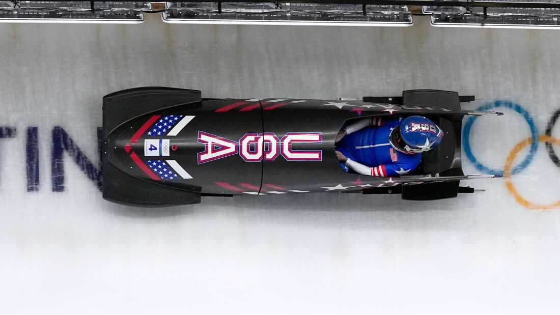 United States' Kaillie Humphries slides down the track during a women's monobob run at the 2026 Winter Olympics, in Cortina d'Ampezzo, Italy, Monday, Feb. 16, 2026.